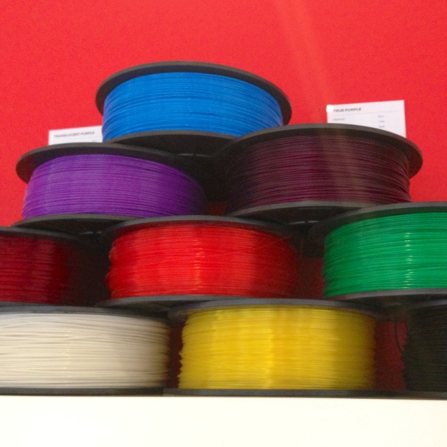The printers use plastic "filament" as opposed to ink. 1kg of filament is around $50.